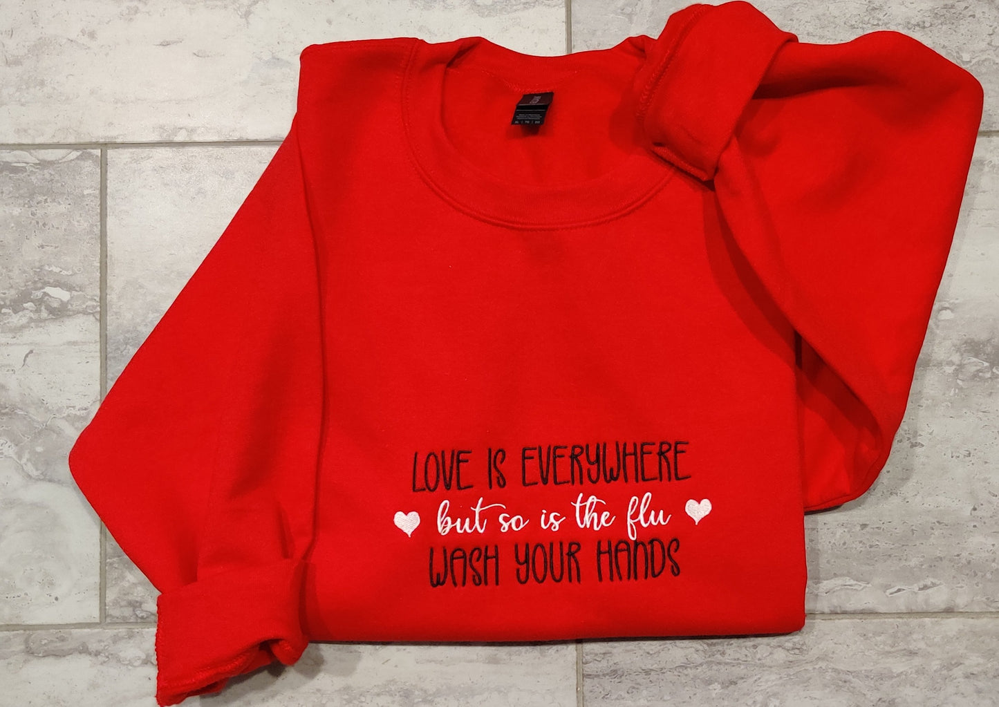 Love is everywhere, but so is the flu, wash your hands.